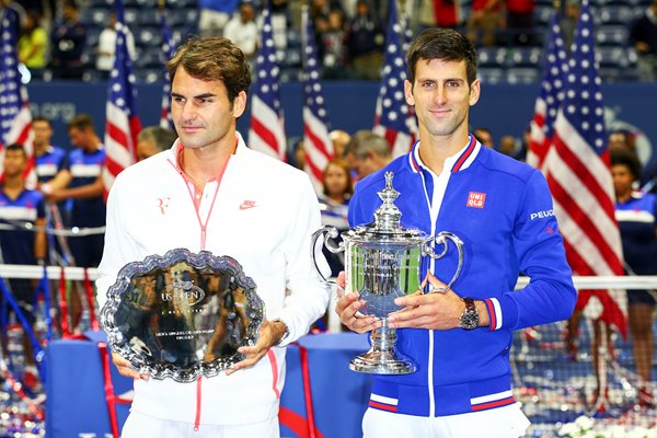 Novak Djokovic and Roger Federer with trophies US Open