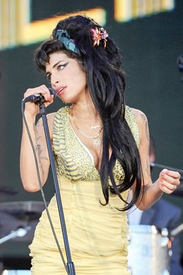 Amy Winehouse performs on stage
