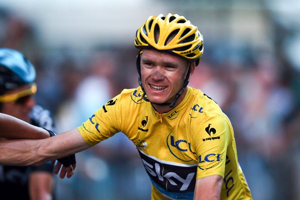 Chris Froome crosses the line in Paris to win 2013 Tour