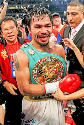 Manny Pacquiao with belts v Antonio Margarito