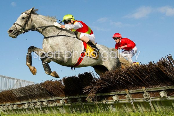 Adam Trinder riding Desert Master clears a hurdle
