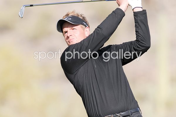 Luke Donald of England plays his tee shot WGC 2011