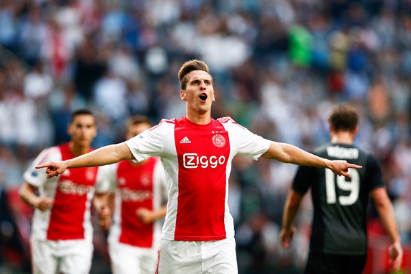 Milik of Ajax Amsterdam celebrates