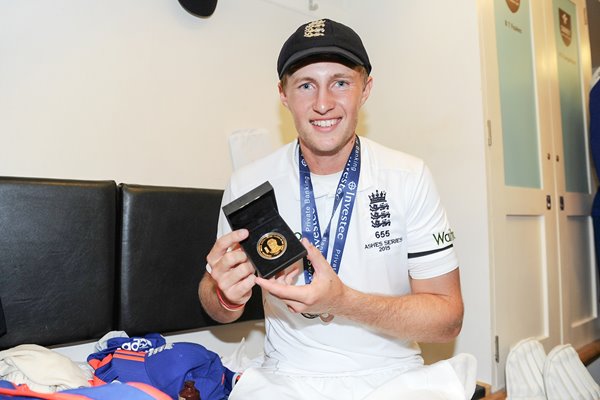 Joe Root with winner medal oval 2015