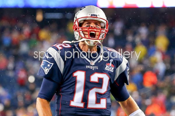 Tom Brady New England Patriots cheers as he runs 