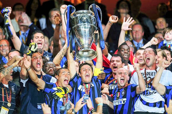 Javier Zanetti of Inter Milan lifts the Champions League trophy