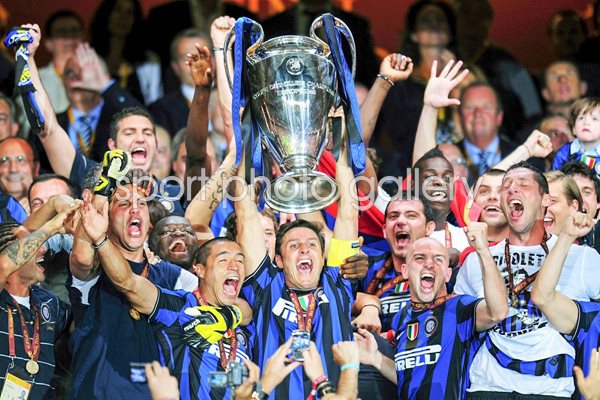 Javier Zanetti of Inter Milan lifts the Champions League trophy