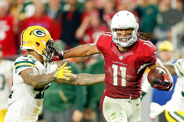 Larry Fitzgerald Arizona Cardinals stiff arms 