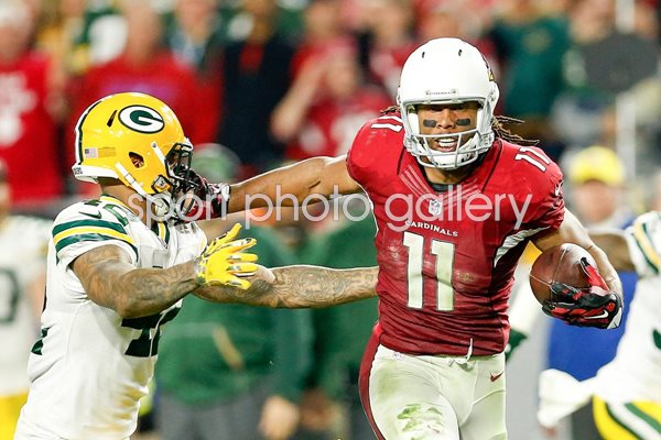 Larry Fitzgerald Arizona Cardinals stiff arms 