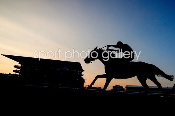  Runner climbs the hill Cheltenham Festival 