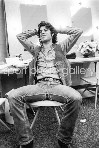 John Travolta relaxes