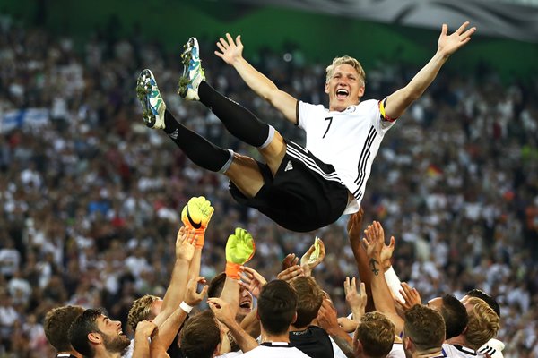 Bastian Schweinsteiger Germany thrown in to the air