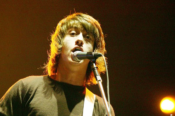 Jamie Cook of The Arctic Monkeys performs