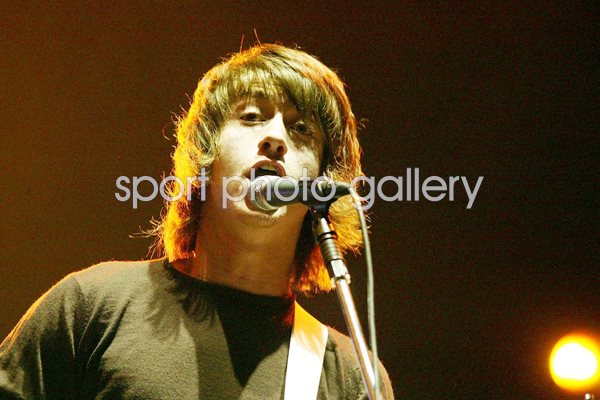 Jamie Cook of The Arctic Monkeys performs