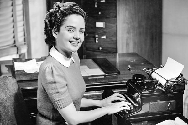 Secretary typing 1950s