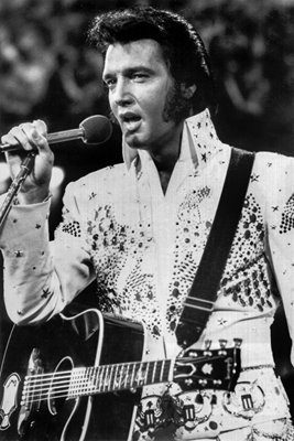 Elvis Presley in white jumpsuit