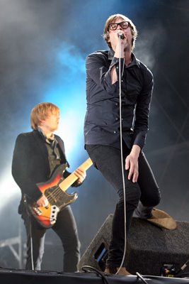 Kasabian perform onstage