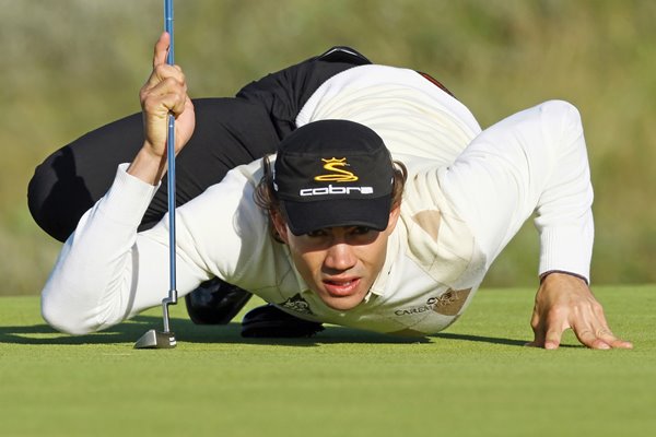 Camilo Villegas takes a worms eye view of putt at Birkdale