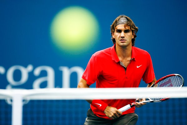 Roger Federer keeps his eye on the ball