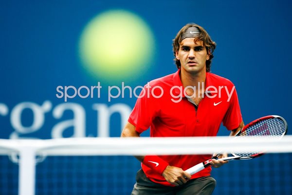 Roger Federer keeps his eye on the ball