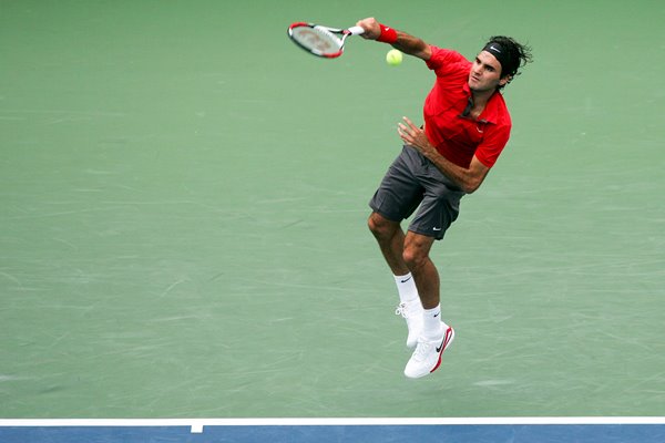 Federer serves in his semi-final