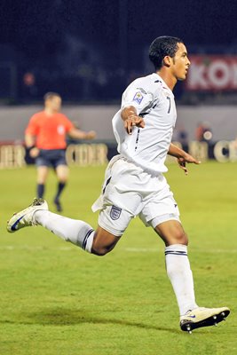 Theo Walcott celebrates his hat trick v Croatia 