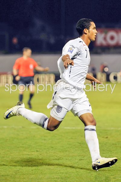 Theo Walcott celebrates his hat trick v Croatia