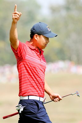 Anthony Kim celebrates during singles win 