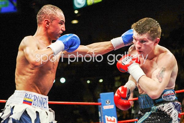 Ricky Hatton slips Paulie Malignaggi jab