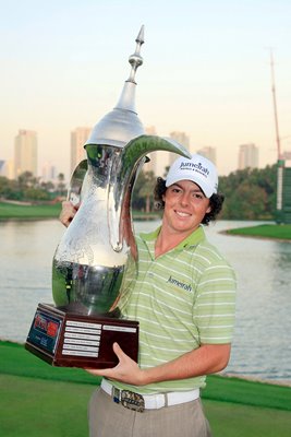 Rory McIlroy with Dubai Desert Classic trophy