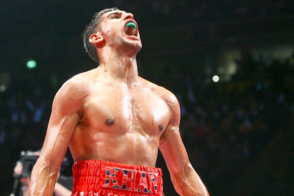 Amir Khan celebrates win over Barrera