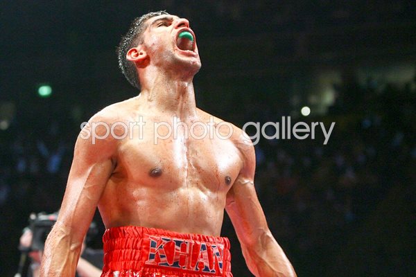 Amir Khan celebrates win over Barrera