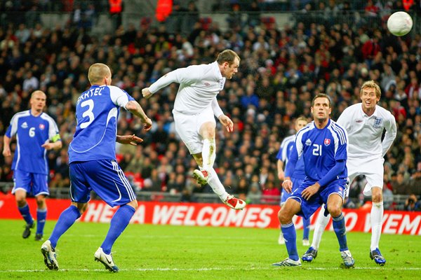 Wayne Rooney heads home v Slovakia Wembley 2009