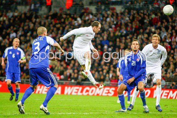 Wayne Rooney heads home v Slovakia Wembley 2009