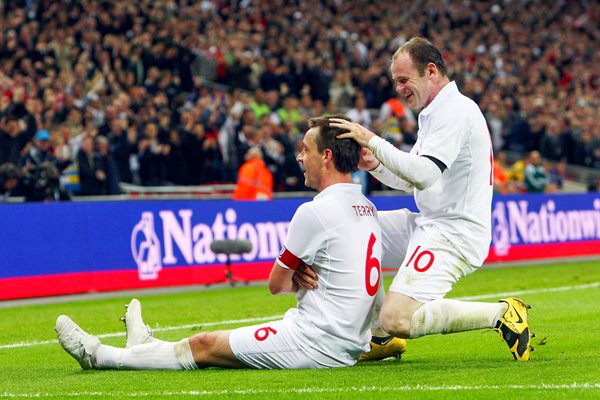 Terry and Rooney in celebration