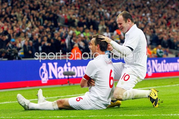 Terry and Rooney in celebration