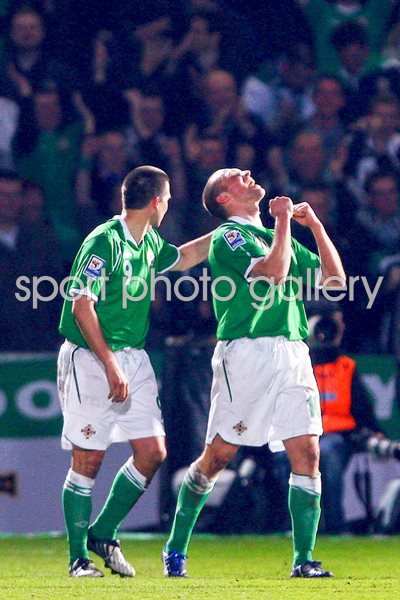 Feeney of Norhtern Ireland celebrates his goal