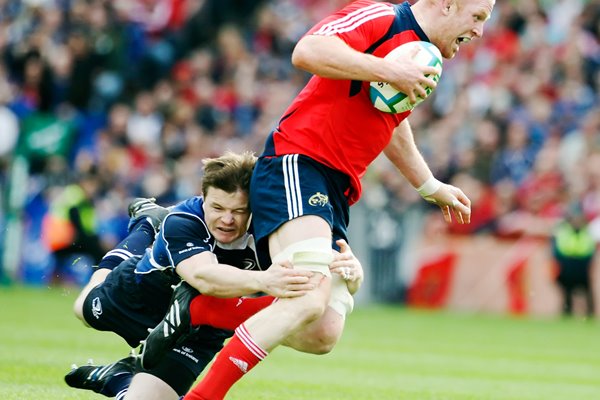 Paul O'Connell tackled by Brian O'Driscoll