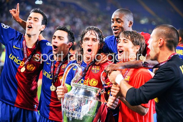 Puyol with his team mates celebrate Champions League 2009 win
