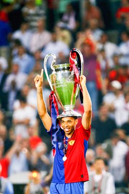 Thierry Henry of Barcelona with the trophy 