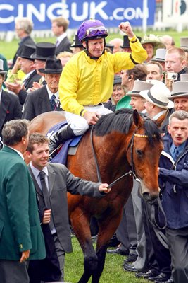 Mick Kinane celebrates 2009 Derby win