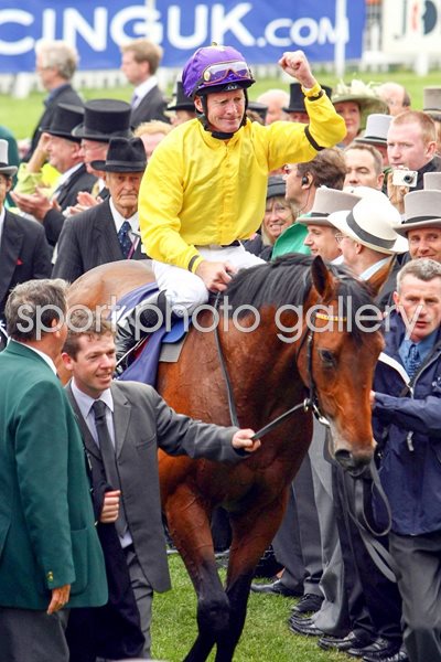 Mick Kinane celebrates 2009 Derby win