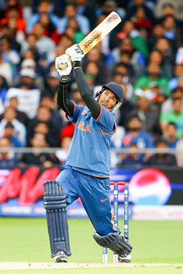 India's Yuvraj Singh hits a six