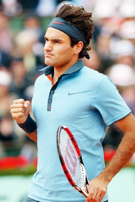 Roger Federer celebrates a point