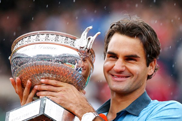 Roger Federer with 2009 French Open trophy