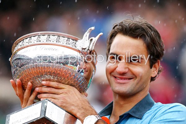 Roger Federer with 2009 French Open trophy