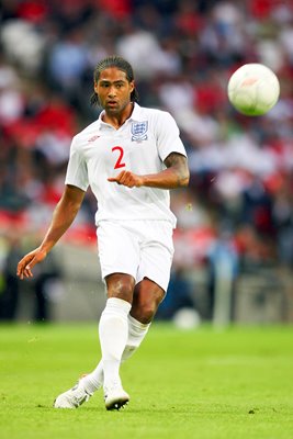 Glen Johnson of England passes the ball