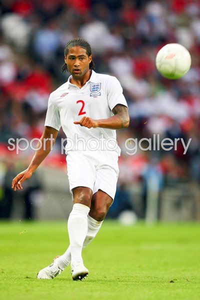 Glen Johnson of England passes the ball