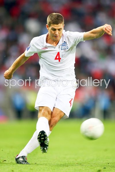 Steven Gerrard passes the ball for England