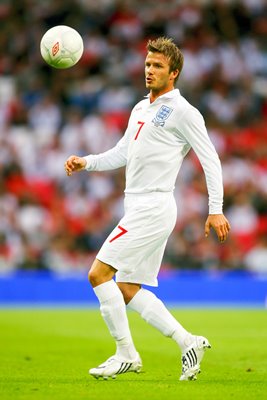 David Beckham controls the ball